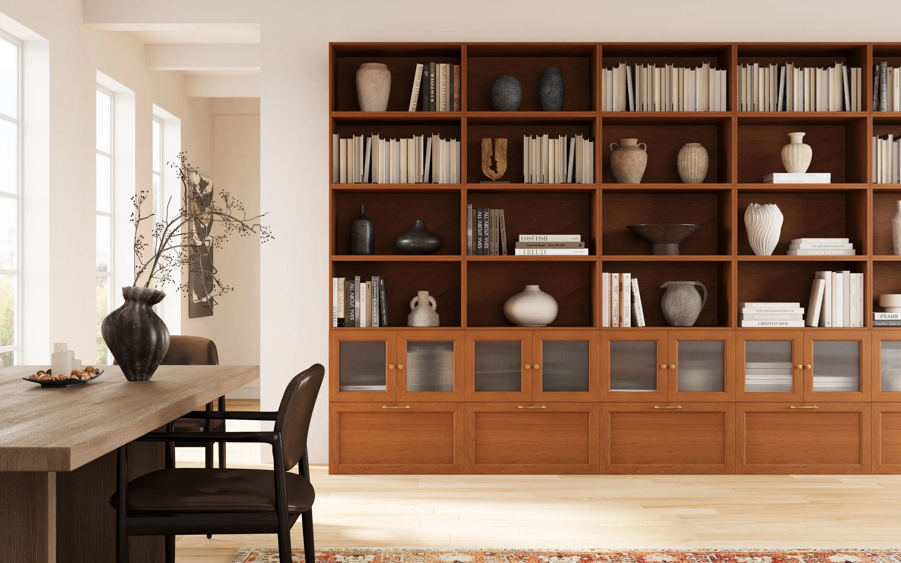 A wall of walnut-colored modular cabinets creates a large bookcase against the wall.
