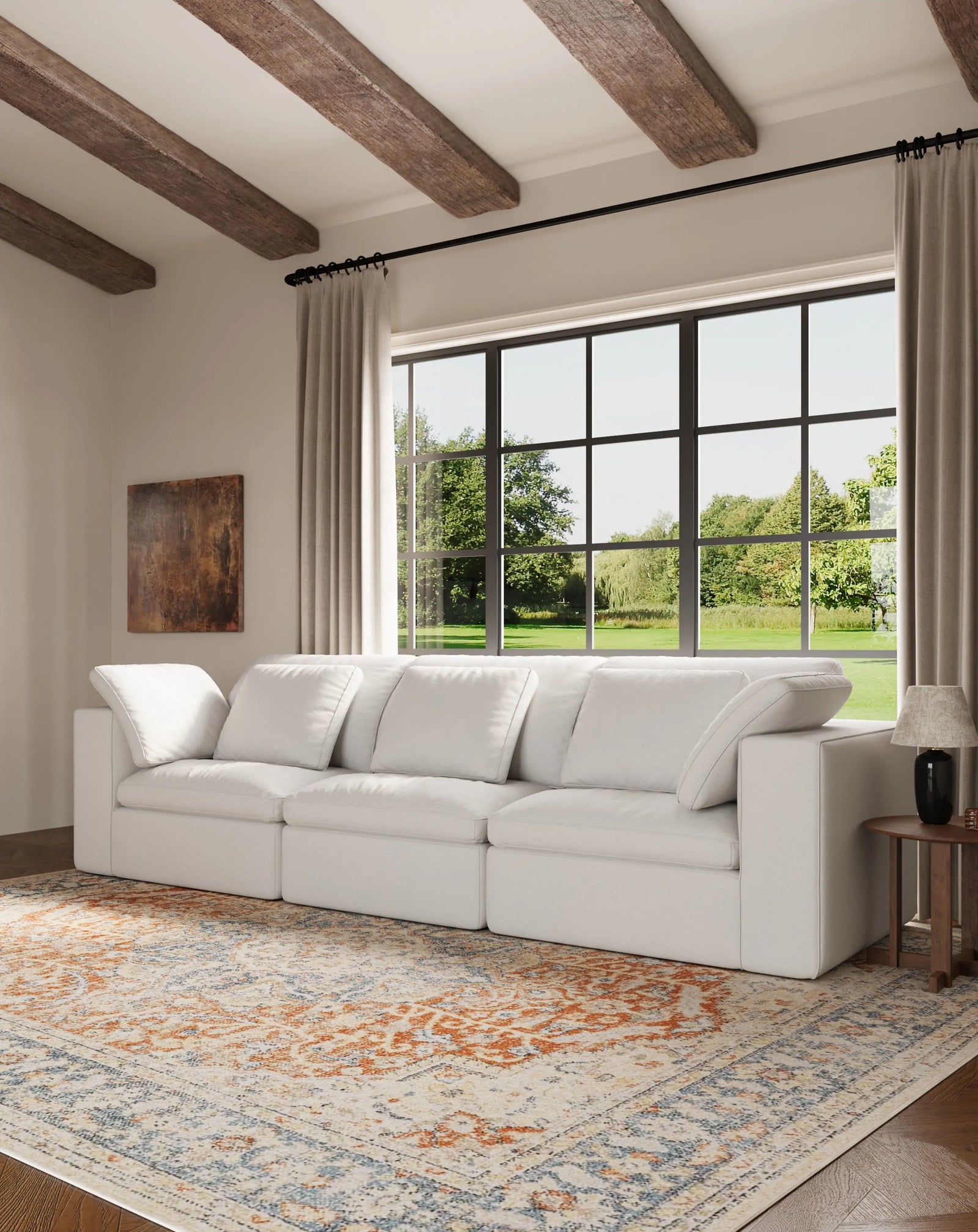 The display effect of the modular 3-seater white sofa in the living room.
