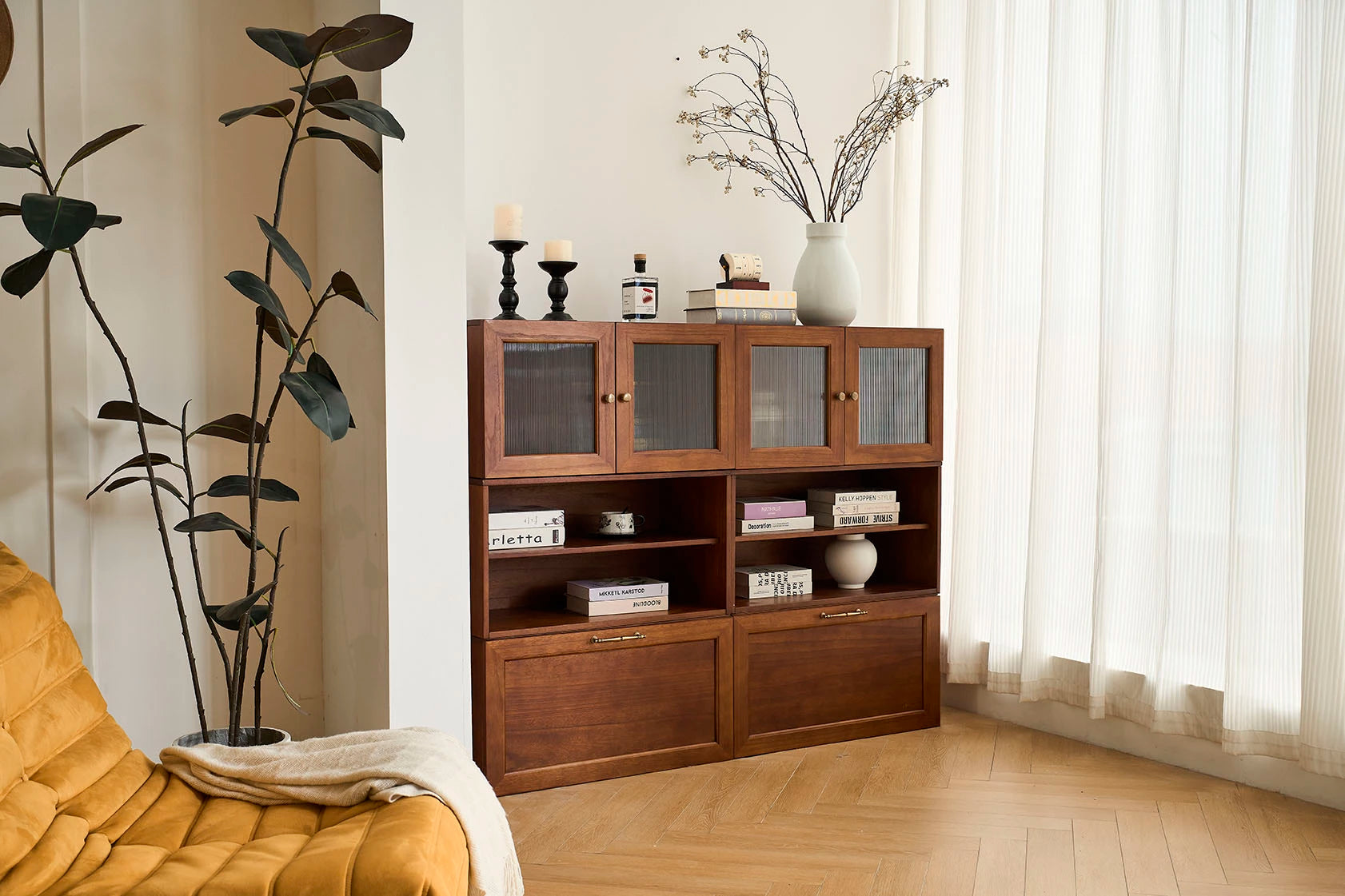 cozy nest's medieval-style living room is equipped with a sideboard consisting of 6 walnut-colored modular basic cabinets.