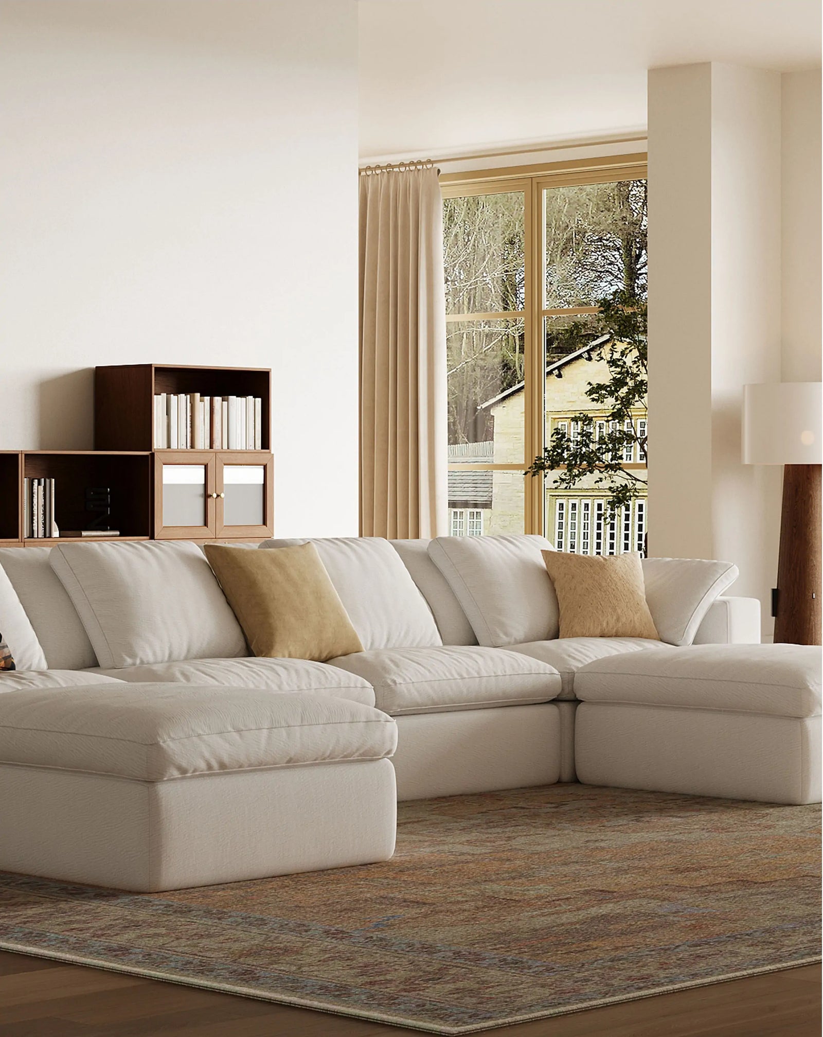There are 6 white modular sofas arranged in a U shape in the living room