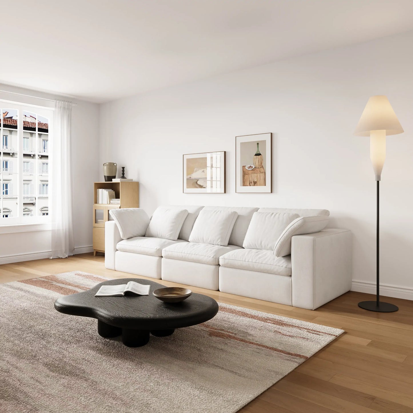 A set of white modular three-seater  sofas and a set of natural wood-colored modular chests of drawers in the modern and simple living room.