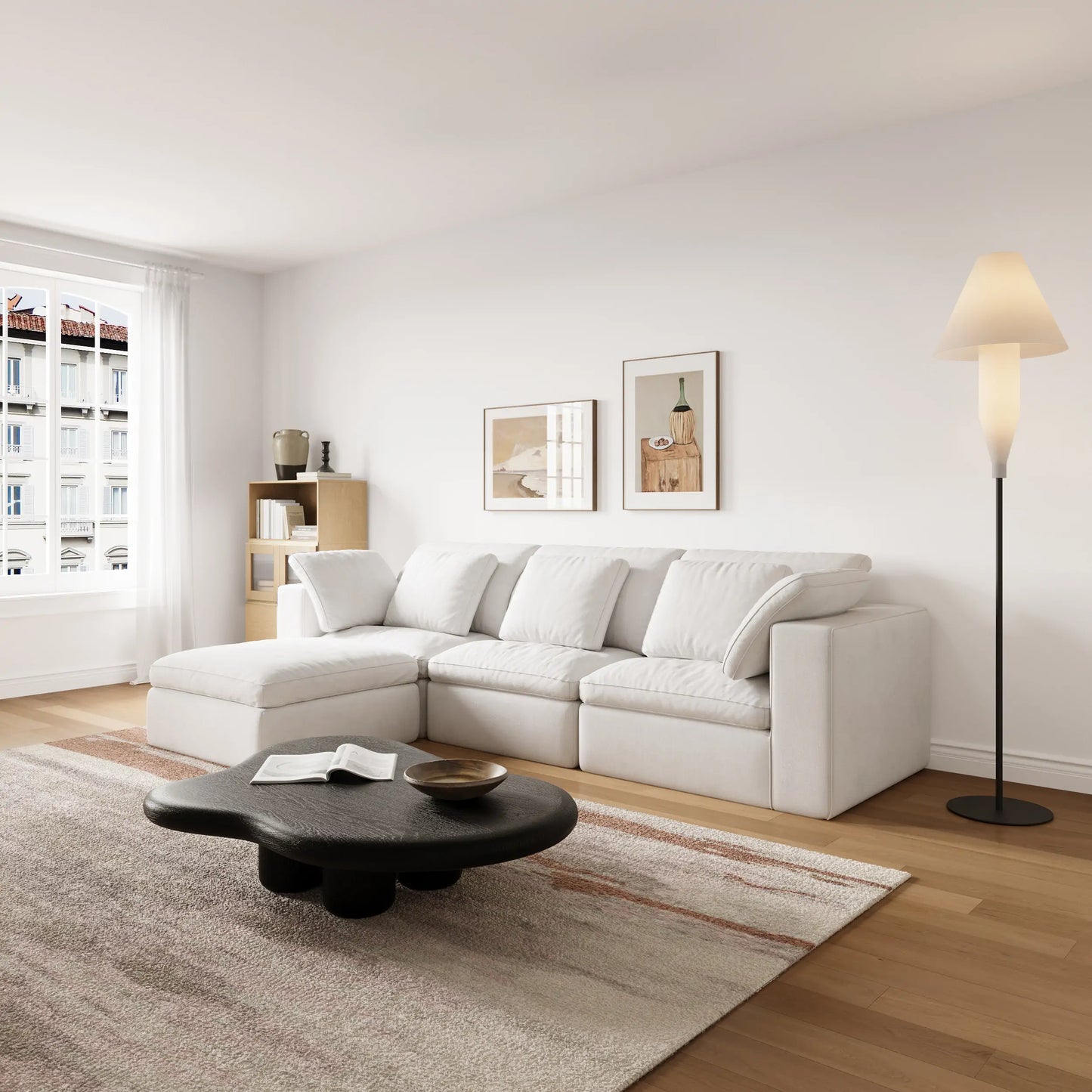 A set of white modular four-seater L-shaped sofas and a set of natural wood-colored modular chests of drawers in the modern and simple living room.