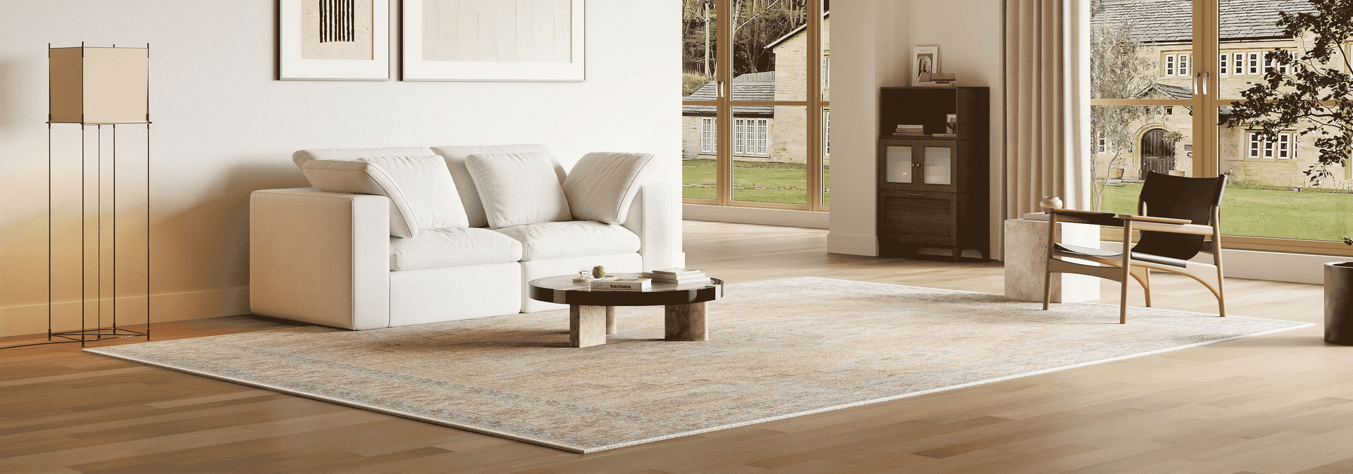 The living room has a double-seater sofa set consisting of two white modular sofas, which can be changed into more different sofa combinations.