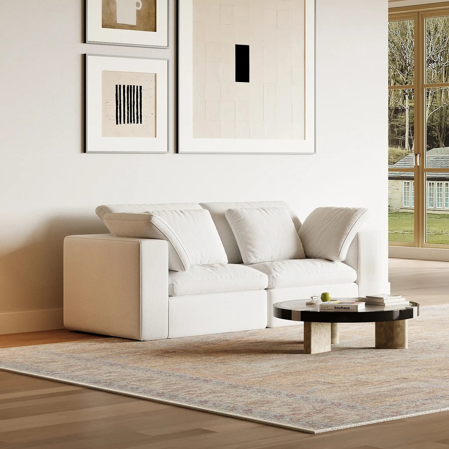 The modern and simple living room is equipped with a modular double sofa.